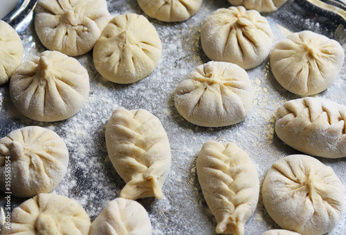 Khinkali before cooking, hand baking