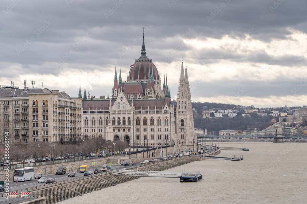 North side of Hungarian Parliament with dome view by Danube river in Budapest