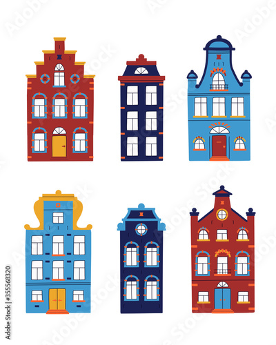 Vector set of minimalistic traditional houses. Vector collection of multi-colored facades of old buildings on white isolated background in scandinavian trendy style.