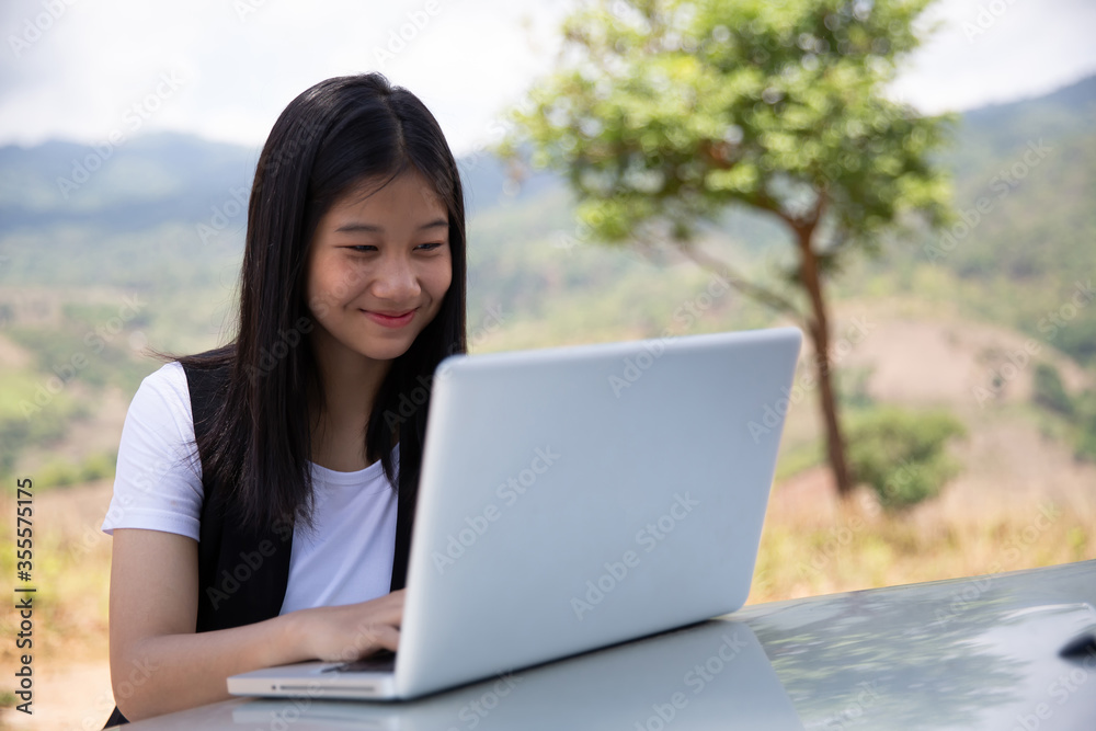 Girl freelancer work typing on laptop Girl freelancer work typing on laptop