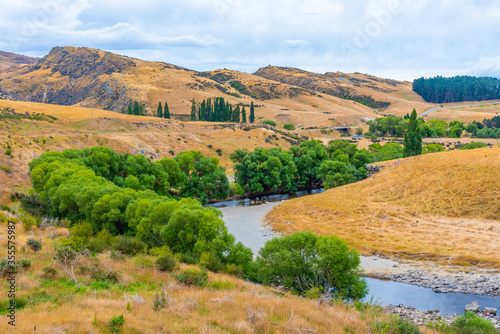 Valley of Taieri river at Central Otago Railway bicycle trail in New Zealand photo