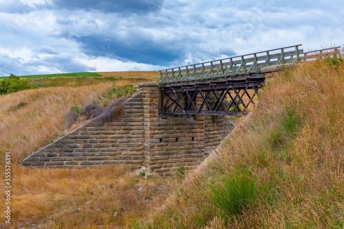 Bridge as a part of Central Otago Railway bicycle trail in New Zealand photo