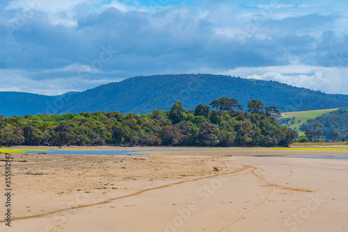 Tahakopa bay at Caitlins region of New Zealand photo