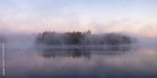 lake with morning fog © Maslov Dmitry