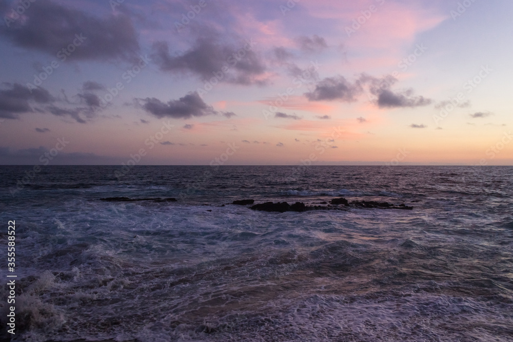 pink and purple sunset over the sea at Laguna Beach, California