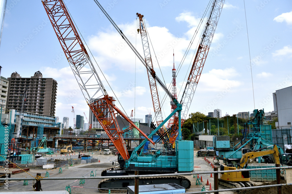 Huge land development site. Crawler crane Lattice boom
