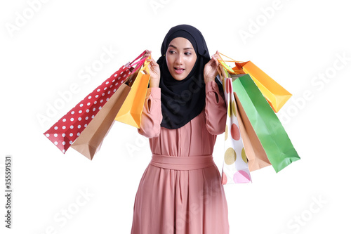 young woman with shopping bags