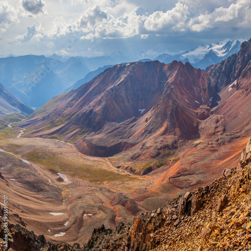 Mountain landscape. Canyon and colored rocks. Mountain pass, trekking.
