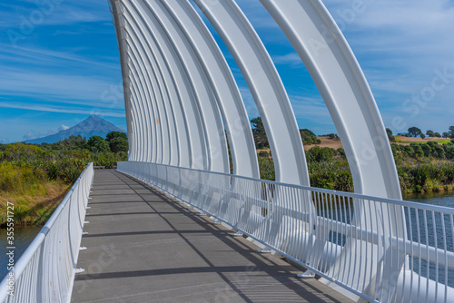 Mt. Taranaki viewed through Te Rewa Rewa bridge at New Plymouth, New Zealand photo