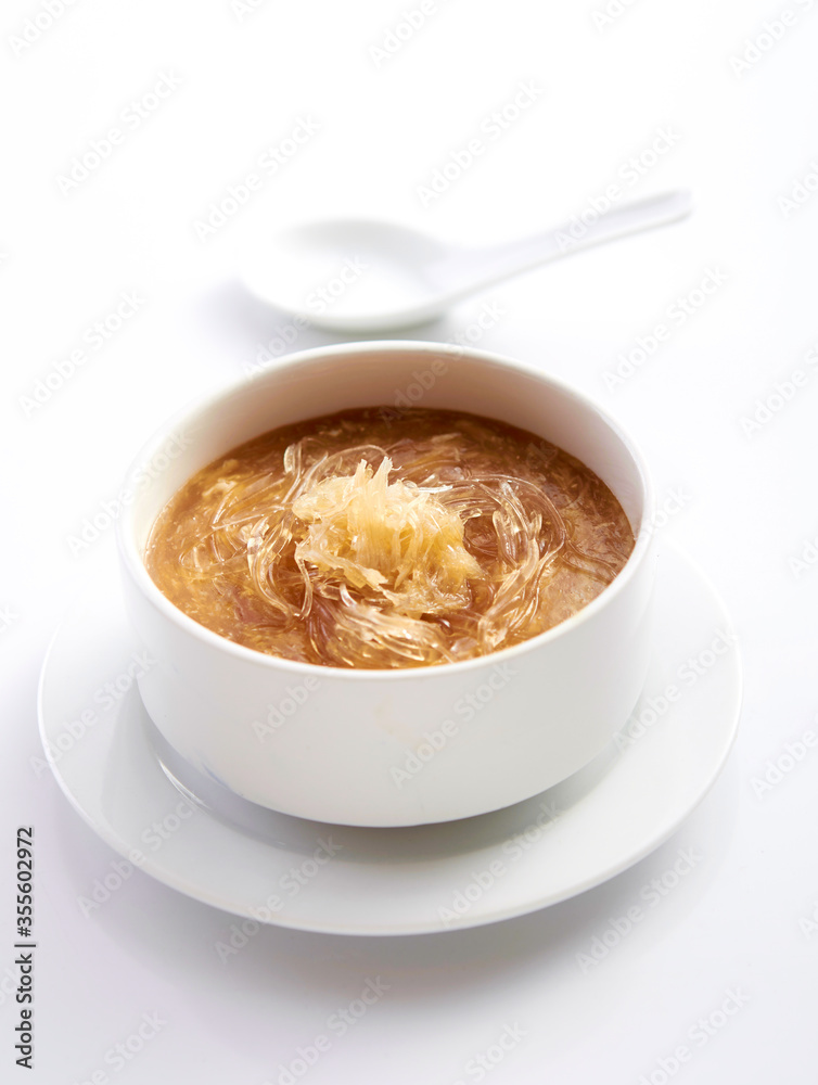 Shark fin soup Chinese food in isolated white background Shark fin soup Chinese food in isolated white background