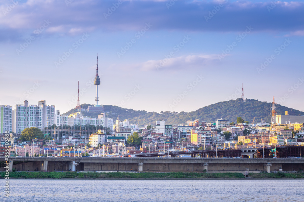 seoul city and Han River in the evening and n seoul tower behind, seoul, south korea.