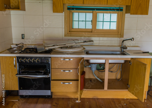 Kitchen cabinets of abandoned house