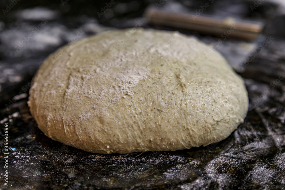 High hydration rye and wheat sourdough ready for shaping artisanal rustic wholegrain sourdough bread loaf, photo series High hydration rye and wheat sourdough ready for shaping artisanal rustic wholegrain sourdough bread loaf, photo series