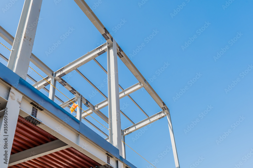 Low angle view of metal frame building Low angle view of metal frame building