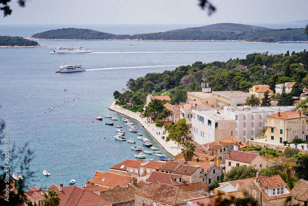 Beautiful view of Hvar old town on the sea shore.
