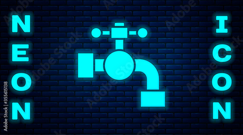 Glowing neon Water tap icon isolated on brick wall background. Vector Illustration.