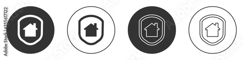 Black House under protection icon isolated on white background. Home and shield. Protection, safety, security, protect, defense concept. Circle button. Vector Illustration.