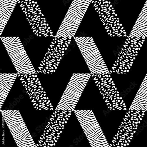 Texture of Zebra stripes and Leopard spots. Seamless pattern. Geometry. Design with manual hatching. Textile. Ethnic boho ornament. Vector illustration for web design or print.