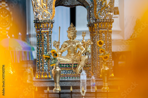 The Erawan Shrine, is Hindu shrines in downtown Bangkok, Thailand photo