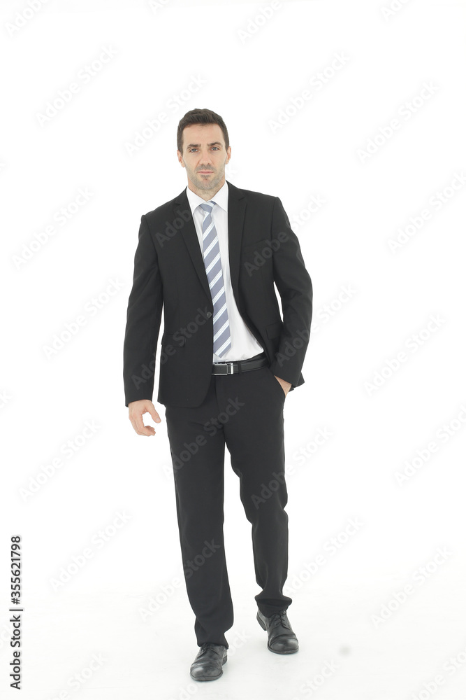 Handsome and smart businessman in black suit isolated on white background. Business and Finance concept. Copy Space Handsome and smart businessman in black suit isolated on white background. Business and Finance concept. Copy Space