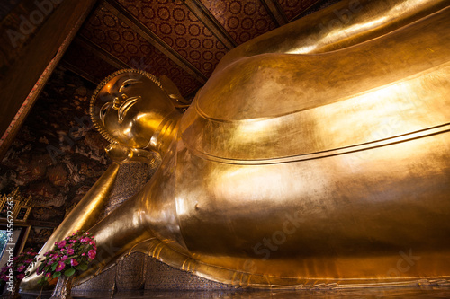Golden reclining buddha statue in wat pho, Bangkok, Thailand