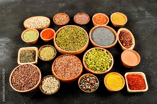black, dark, bowl, colorful, cooking, spice, ingredient, dry, condiment, flavor, aroma, powder, aromatic, various, cuisine, collection, different, indian, seasoning, color, spicy, taste, chili, variet