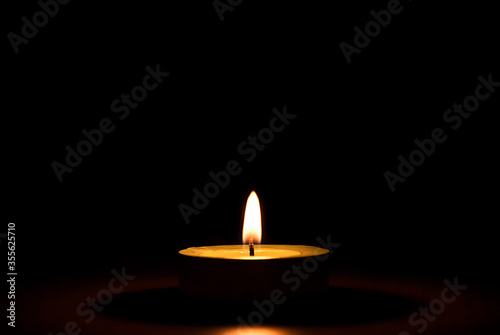 Obraz na płótnie candle in the dark