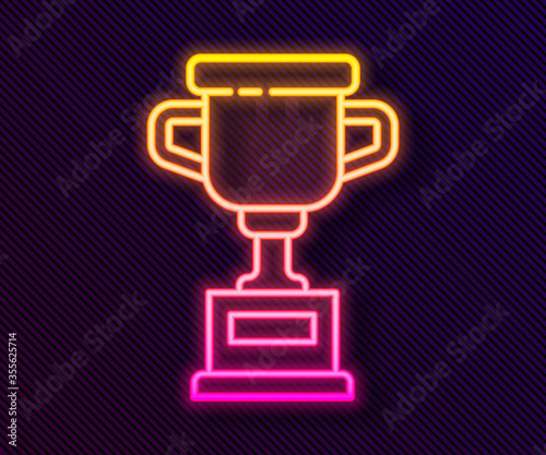 Glowing neon line Award cup icon isolated on black background. Winner trophy symbol. Championship or competition trophy. Sports achievement sign. Vector Illustration.