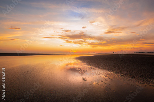 Colorful landscape view with clouds and sky at sunset  on the beach in summer