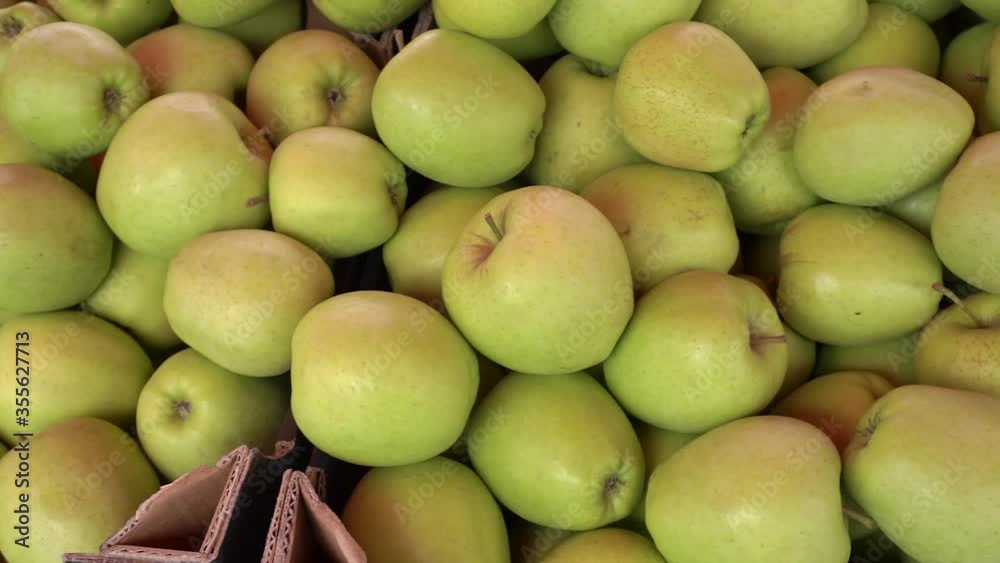 Green apples on the market for sale. Green apples on the market for sale.