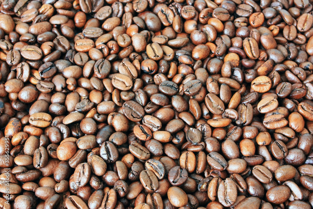Coffee beans lie on the table Coffee beans lie on the table
