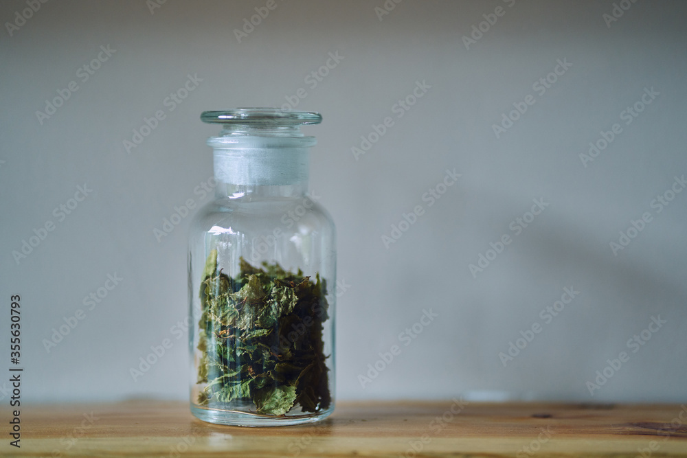 dry grass in a glass jar. interior decoration elements dry grass in a glass jar. interior decoration elements
