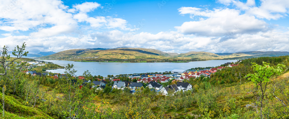 Aerial view of Tromso, mountains and hills and Tromsoysundet strait in Norway