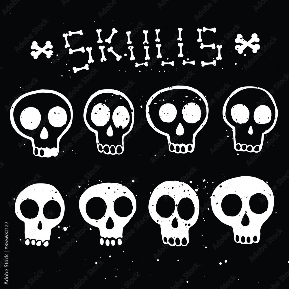 Illustration set of white skulls in ink on black background Illustration set of white skulls in ink on black background
