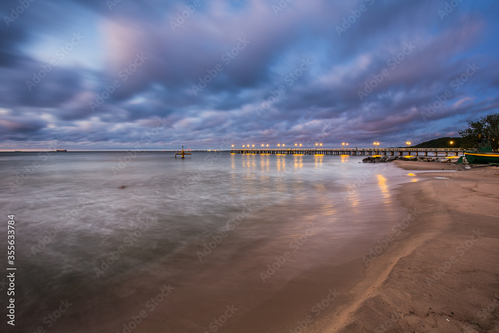 stormy sunrise over the baltic sea in Gdynia Orlowo, Poland