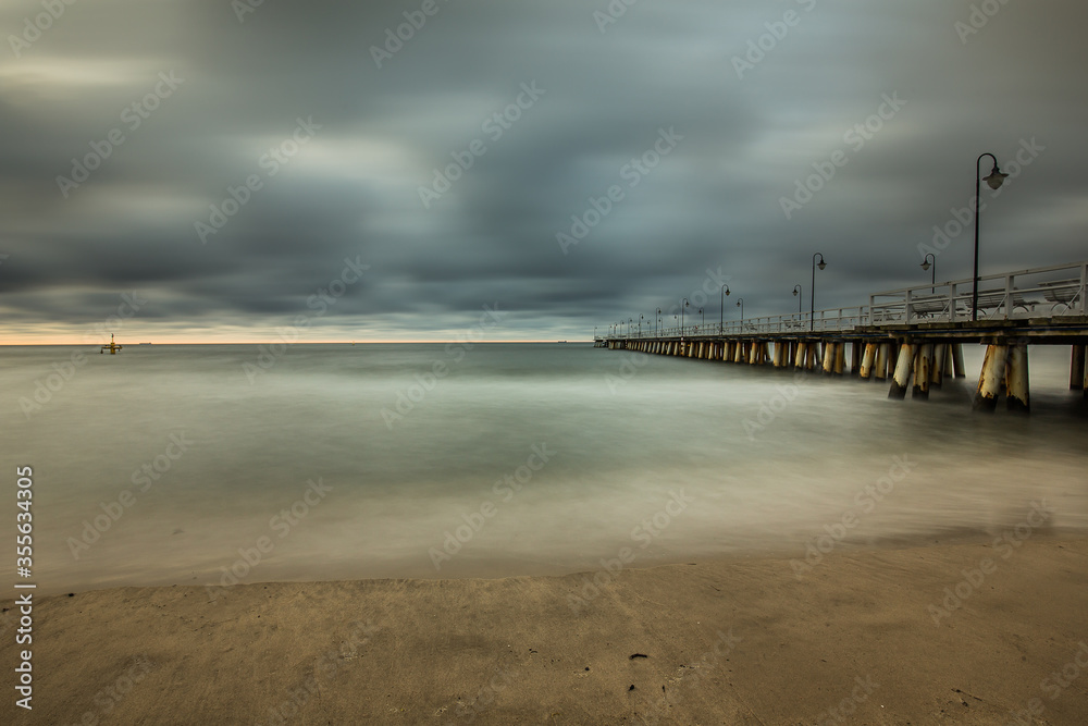 Stormy sunrise over the baltic sea in Gdynia Orlowo, Poland