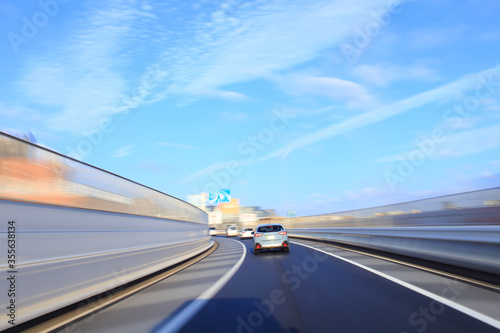 Speeding car on metropolitan expressway