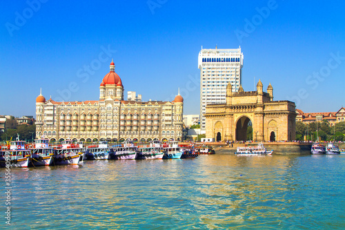 The Gateway of India and boats as seen from the Mumbai Harbour in Mumbai, India photo