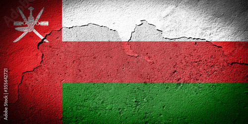 Oman flag on cracked wall