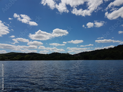 Lake Laacher See Mendig Germany June 2019 in the afternoon beautiful weather with blue sky and interesting clouds
