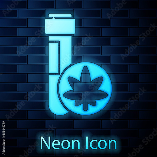 Glowing neon Chemical test tube with marijuana or cannabis leaf icon isolated on brick wall background. Research concept. Laboratory CBD oil. Vector Illustration.