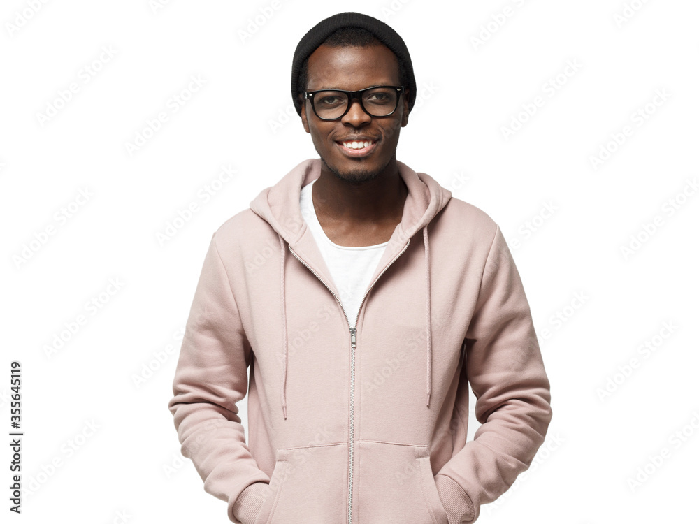 Handsome african american man standing in pink hoodie, black hat and trendy  glasses, smiling with confident look, isolated on white background  Stock-Foto | Adobe Stock