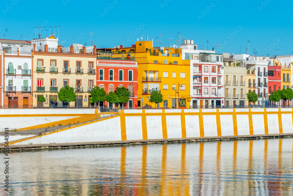 Fototapeta premium Triana neighborhood behind river Guadalquivir in Sevilla, Spain