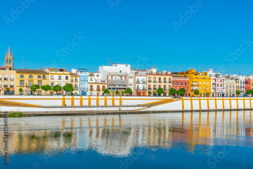 Triana neighborhood behind river Guadalquivir in Sevilla, Spain photo