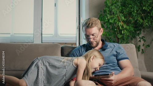 Freelancer work at home. Dad and daughter. Children interfere with work