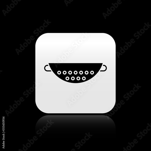 Black Kitchen colander icon isolated on black background. Cooking utensil. Cutlery sign. Silver square button. Vector Illustration.