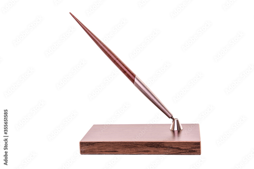 Fountain pen on wooden stand isolated on white background. Fountain pen on wooden stand isolated on white background.