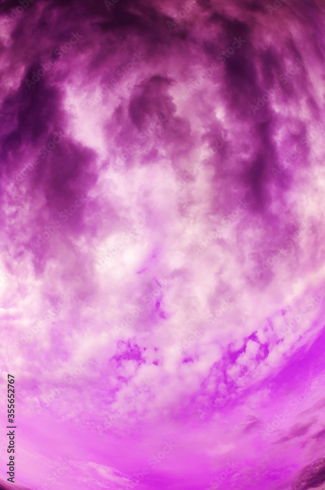 Natural sky composition. Dark ominous storm rain clouds. Dramatic sky. Overcast stormy cloudscape. Thunderstorm. Element of apocalypse design. Toned purple.