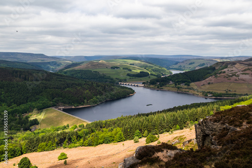 Landscape of Ladybower reservoir shot from bamford edge crags looking down on to the road bridge in the peak district national park © Tim
