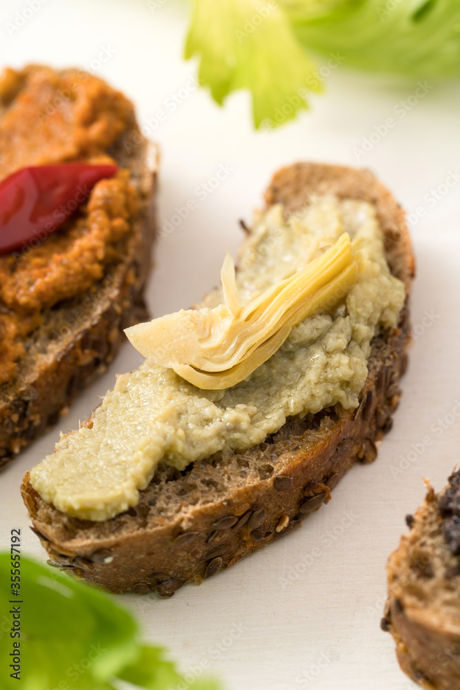 Artichoke pate. Preserves prepared at home as a side dish or appetizer typical of southern Italy in particular from Puglia Artichoke pate. Preserves prepared at home as a side dish or appetizer typical of southern Italy in particular from Puglia